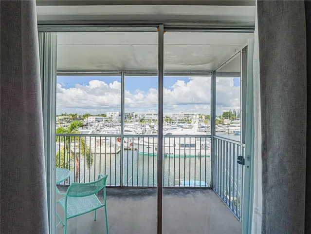 a view of a room that has a large window