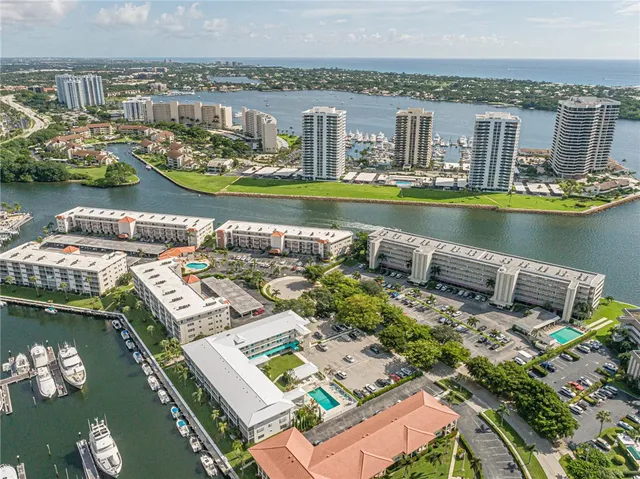 an aerial view of a house with a ocean view