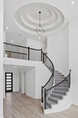 a view of entryway with wooden floor
