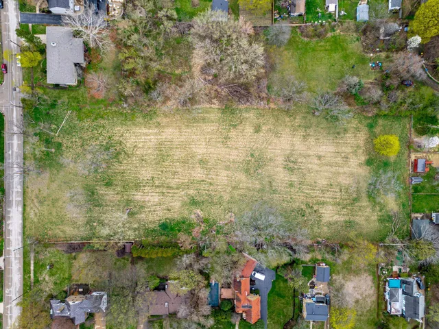 a view of fountain in middle of a lake