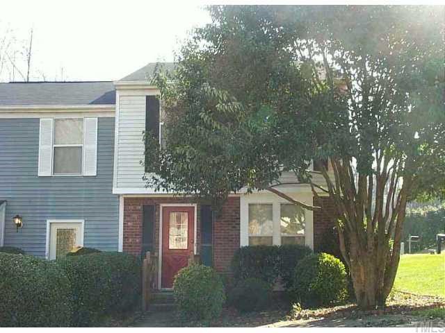 7200 Shellburne Drive Raleigh, NC 27612 - Photo 1 of 1 a front view of a house with trees and plants