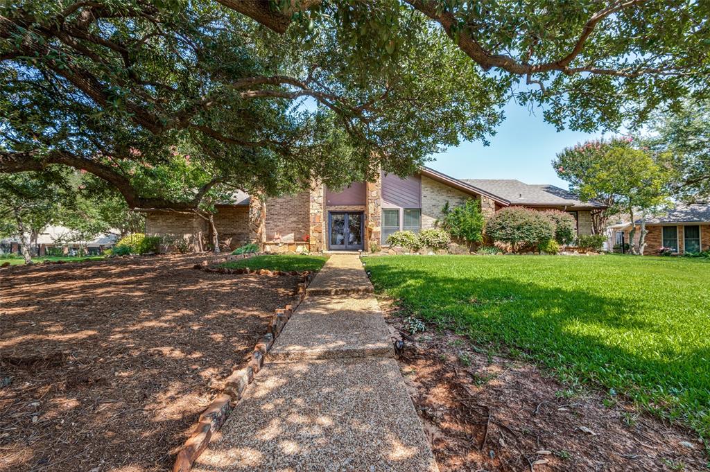a front view of house with yard