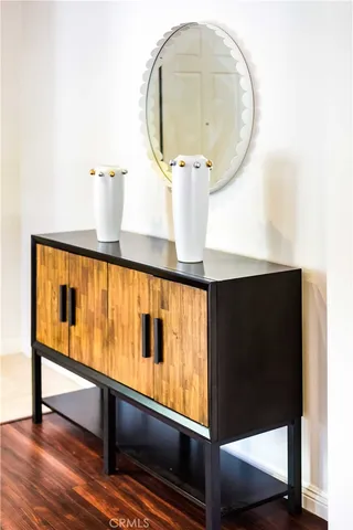 an entryway with wooden floor