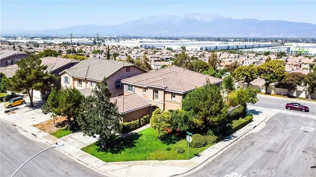 an aerial view of a house with a garden