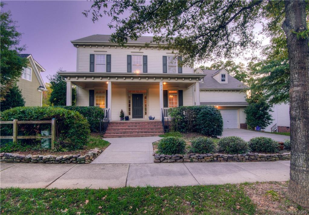 915 Derricks Crossing Fort Mill, SC 29708 - Photo 2 of 24 a front view of a house with yard and trees