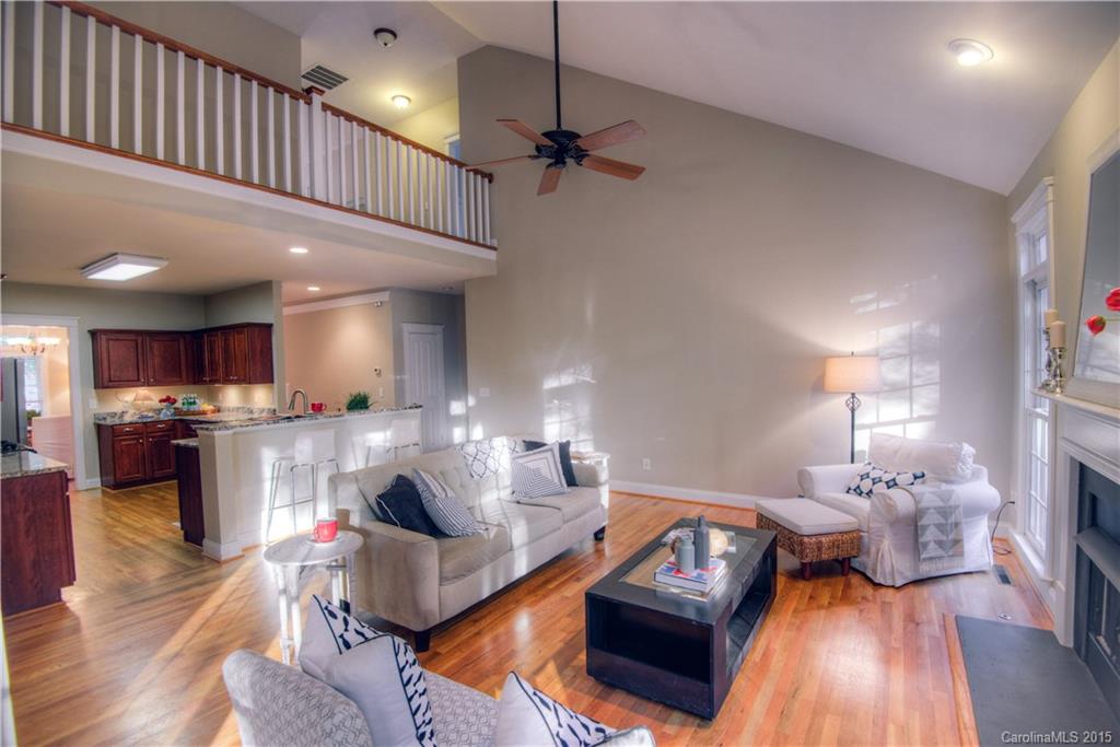 915 Derricks Crossing Fort Mill, SC 29708 - Photo 11 of 24 a living room with furniture and a wooden floor