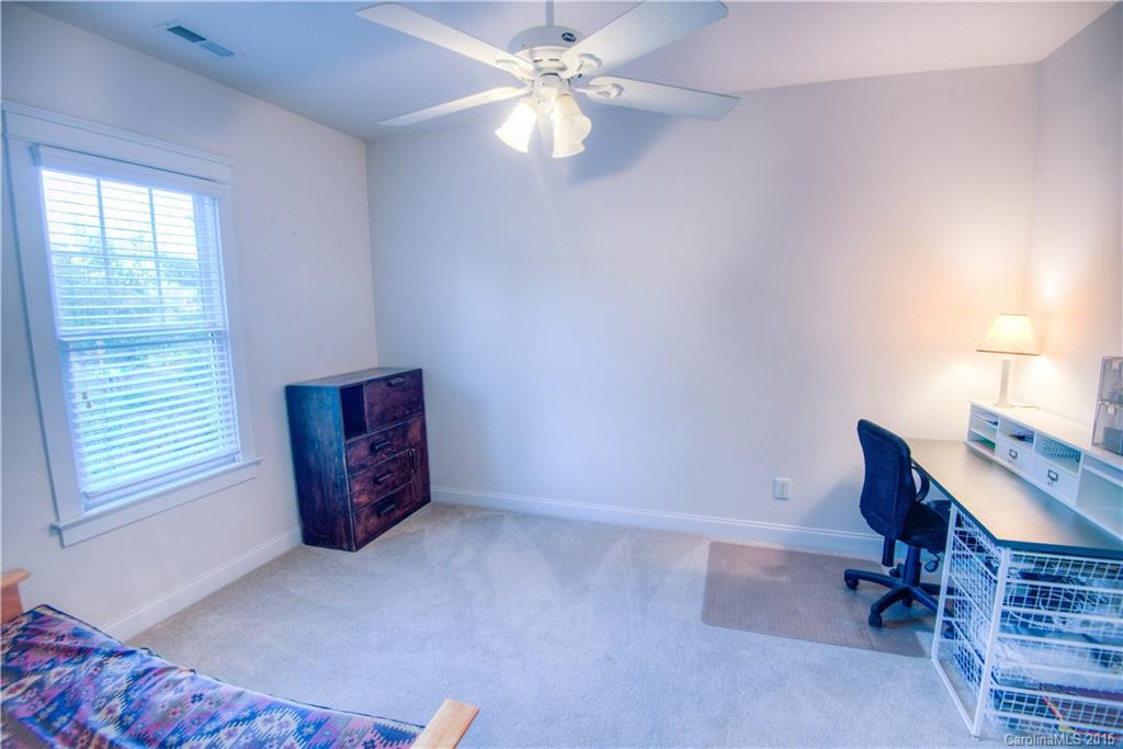 915 Derricks Crossing Fort Mill, SC 29708 - Photo 21 of 24 an empty room with windows and fan