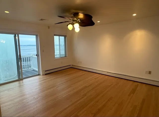 a view of entryway with stairs and a window