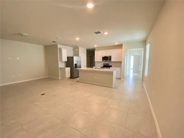 a view of a kitchen with a sink
