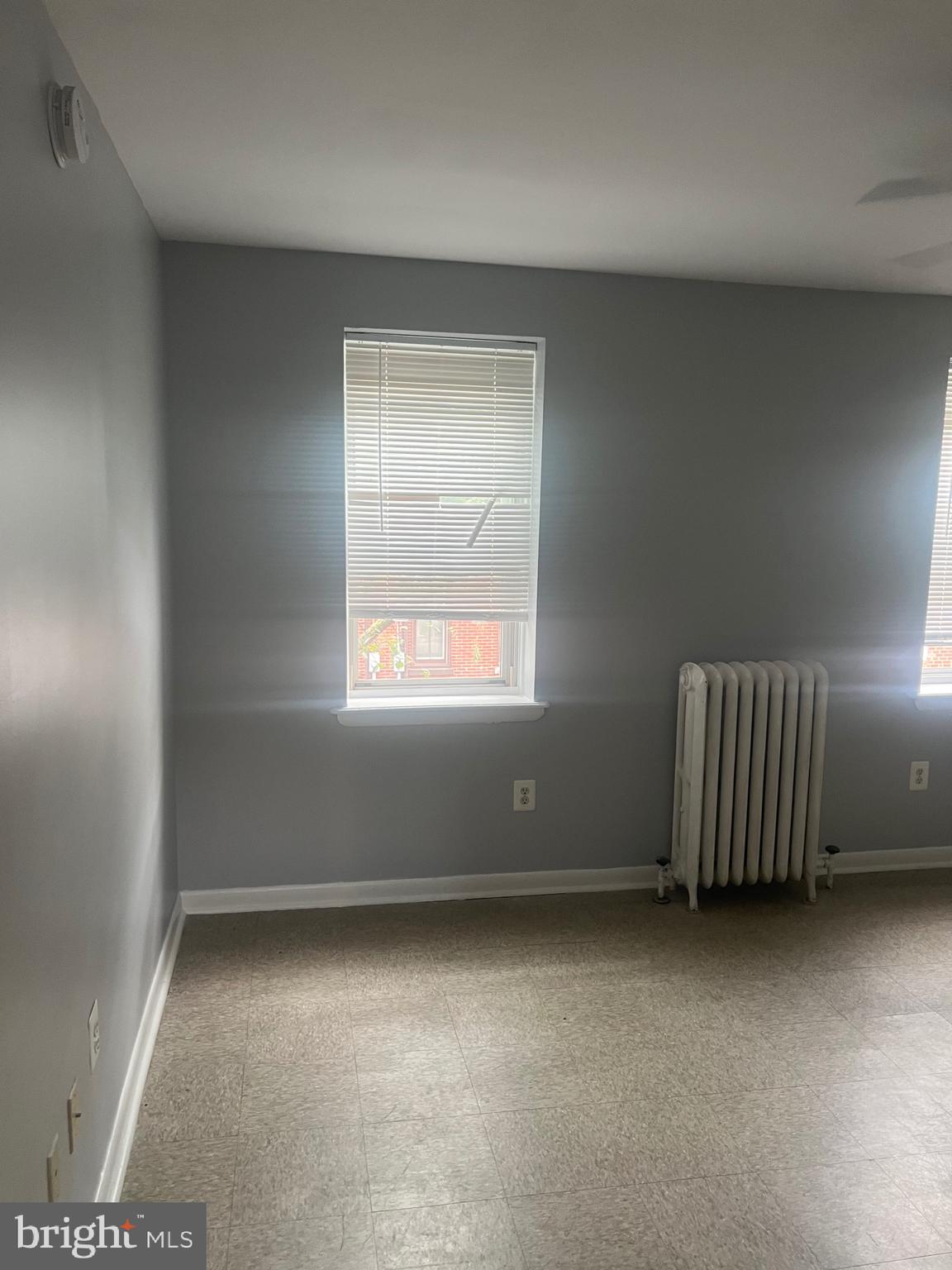 1917 Carpenter Street Philadelphia, PA 19146 - Photo 14 of 28 an empty room with a window