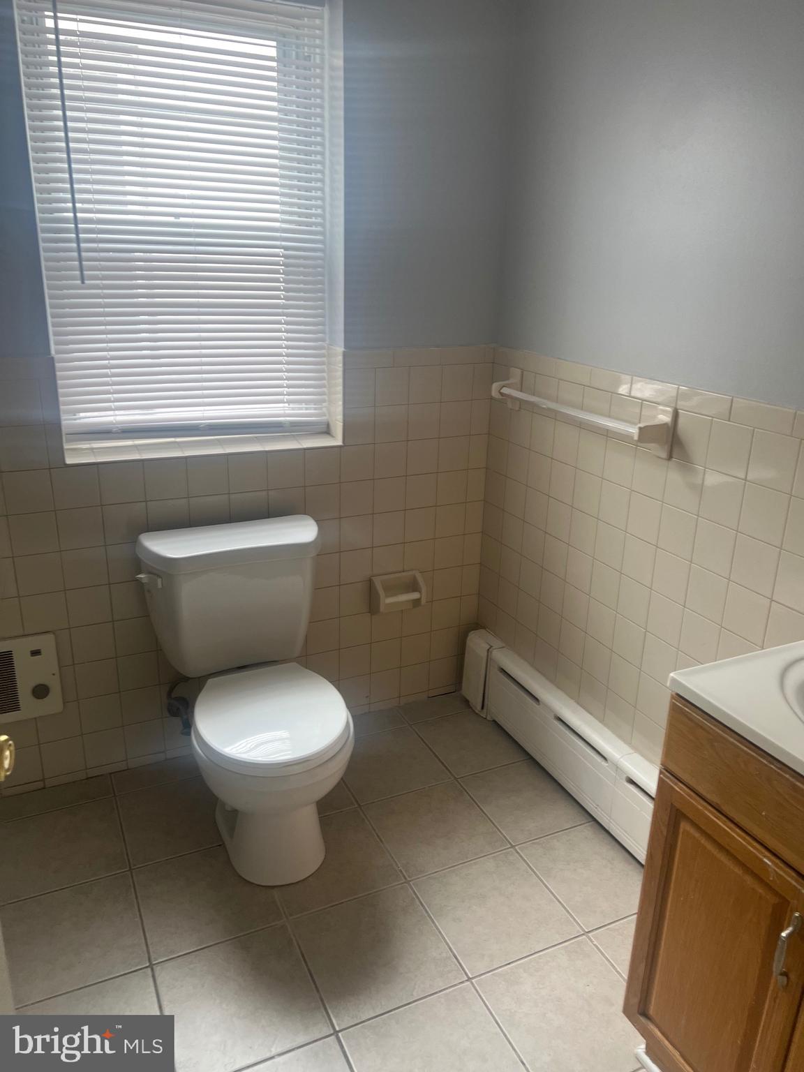 1917 Carpenter Street Philadelphia, PA 19146 - Photo 17 of 28 a bathroom with a toilet and a shower