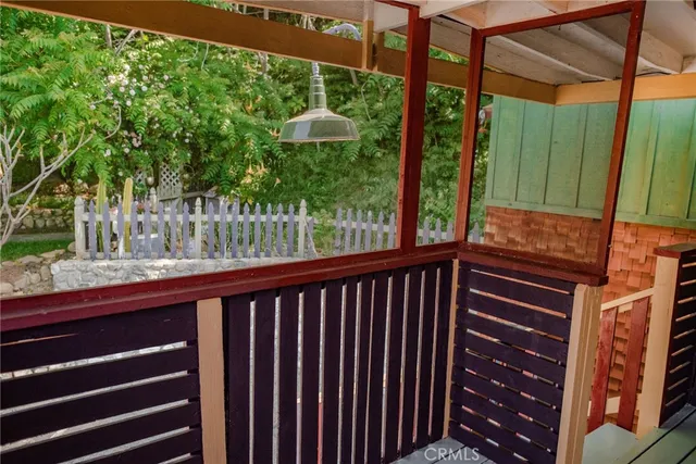 a view of a balcony with a swing