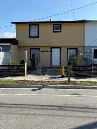 a view of a house with a rug