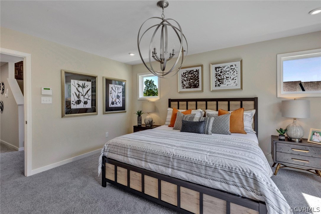 12707 Deep Well Road Midlothian, VA 23112 - Photo 19 of 50 a bedroom with a bed a painting on the wall and a window