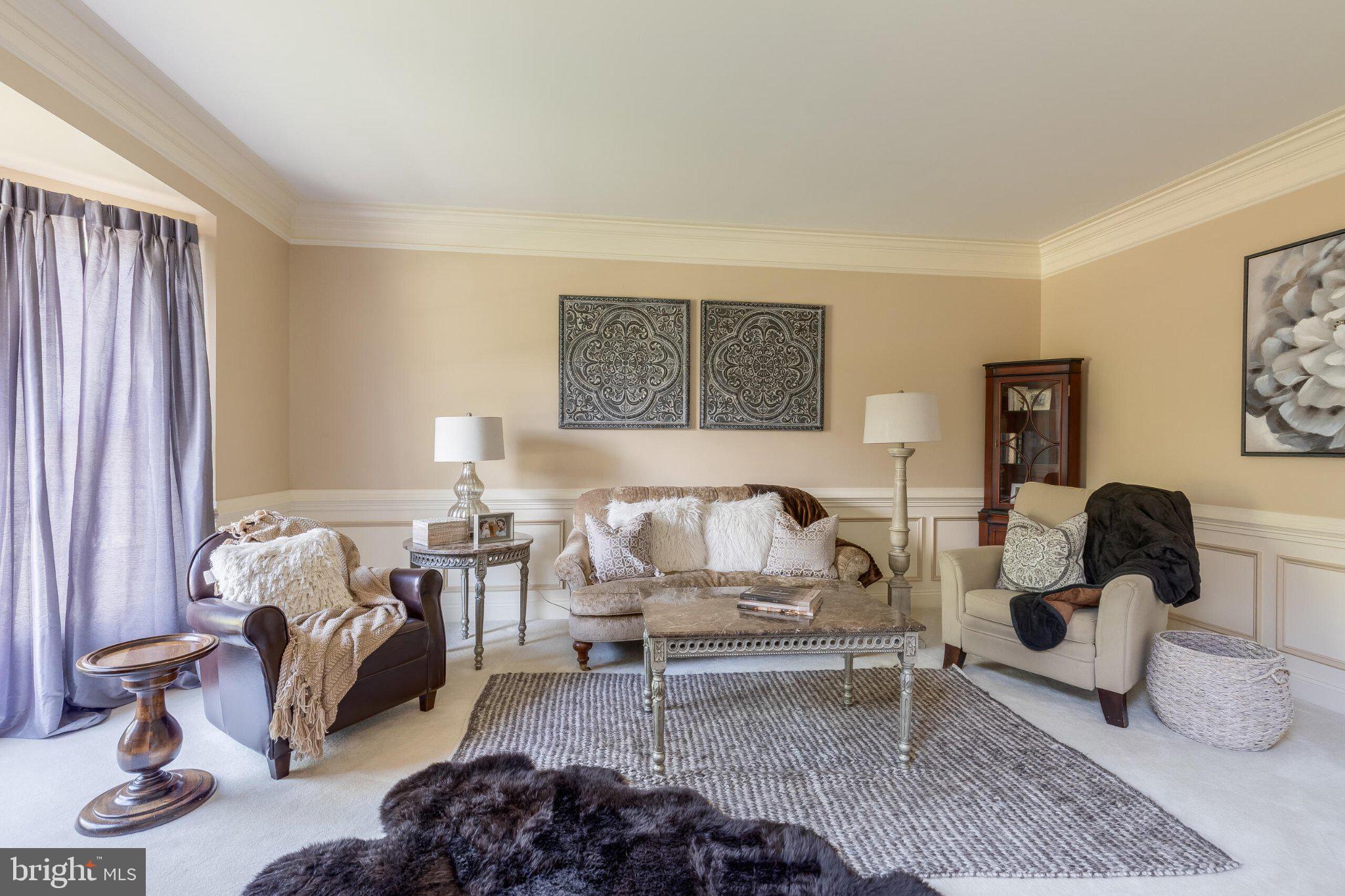 25554 Mimosa Tree Court Chantilly, VA 20152 - Photo 11 of 85 a living room with furniture and a window