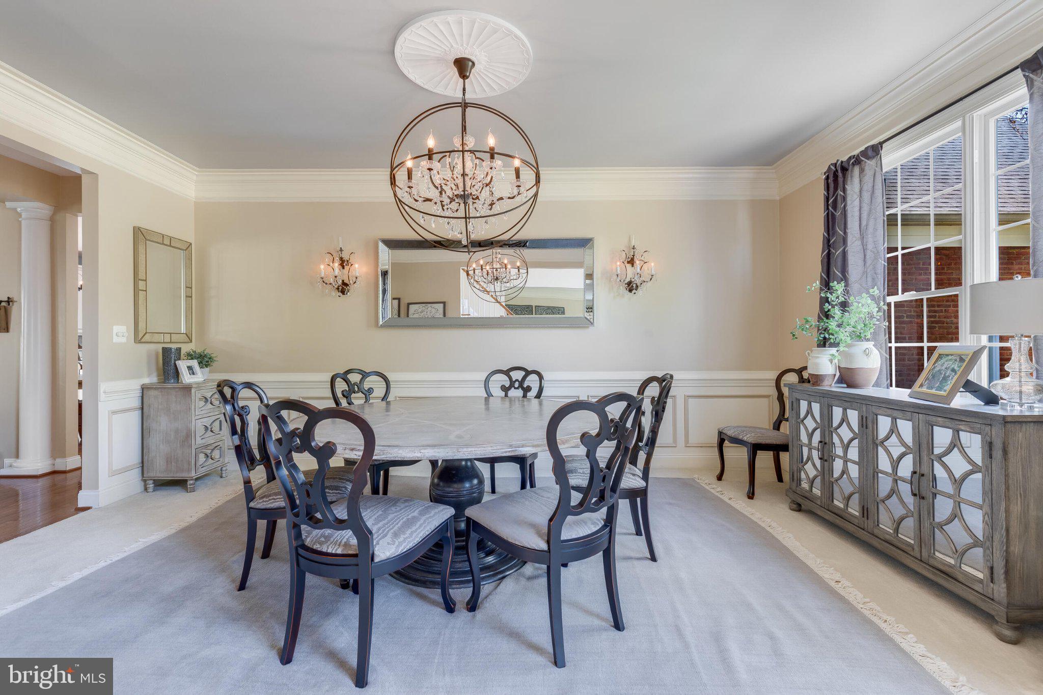 25554 Mimosa Tree Court Chantilly, VA 20152 - Photo 16 of 85 a view of a dining room with furniture window and wooden floor