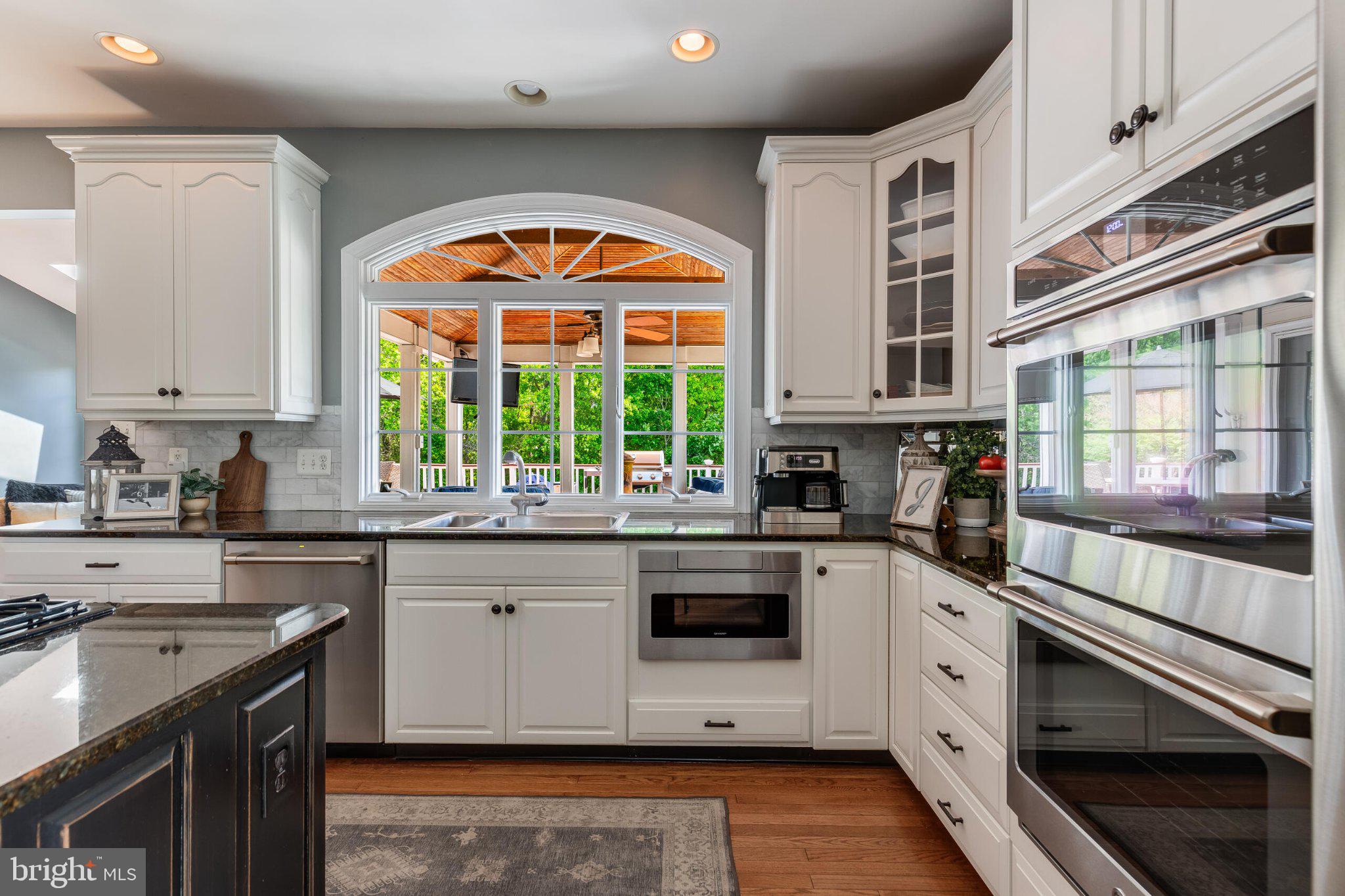 25554 Mimosa Tree Court Chantilly, VA 20152 - Photo 31 of 85 Bright kitchen with scenic views.