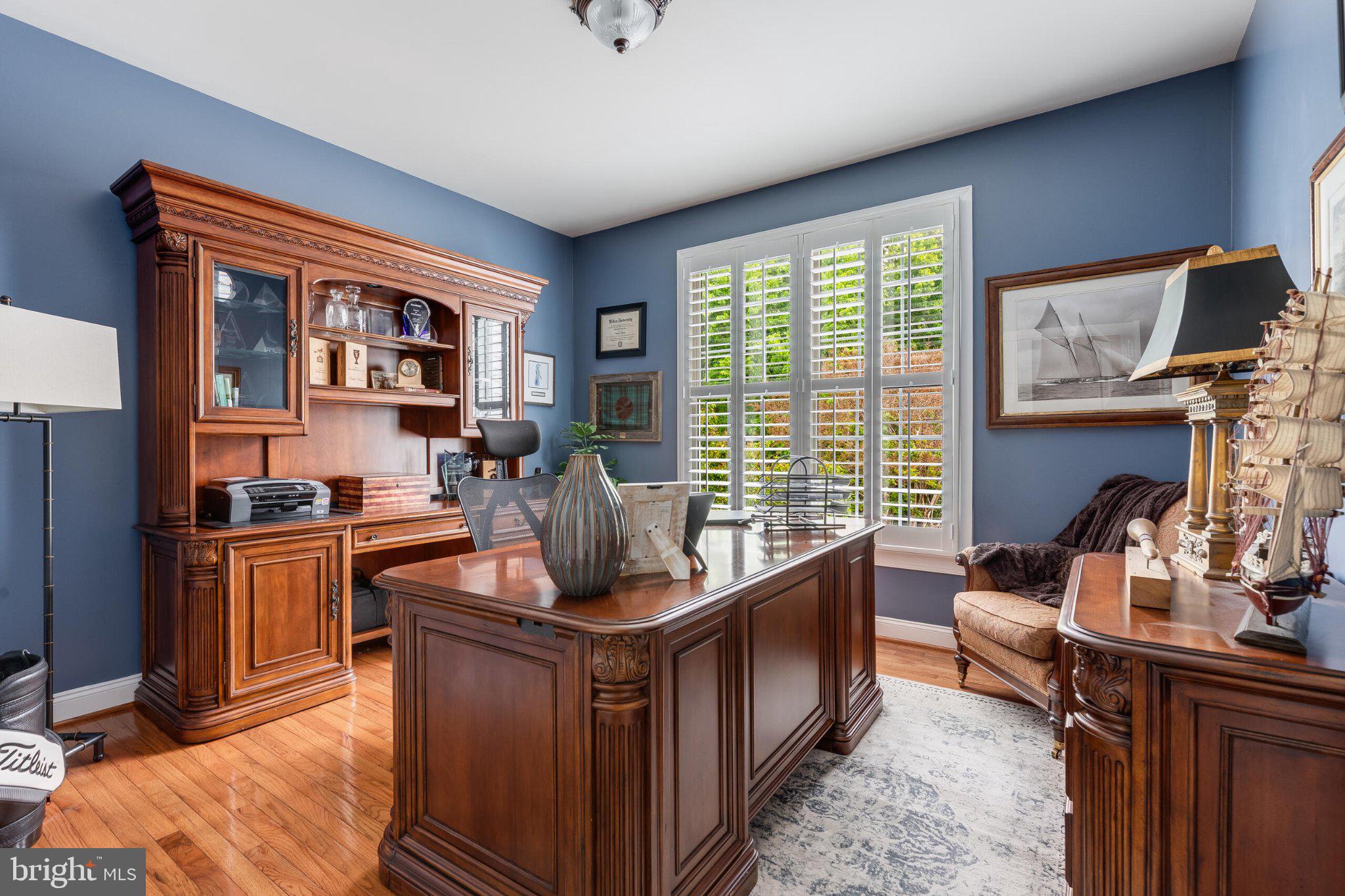 25554 Mimosa Tree Court Chantilly, VA 20152 - Photo 44 of 85 Elegant home office with rich wood tones.