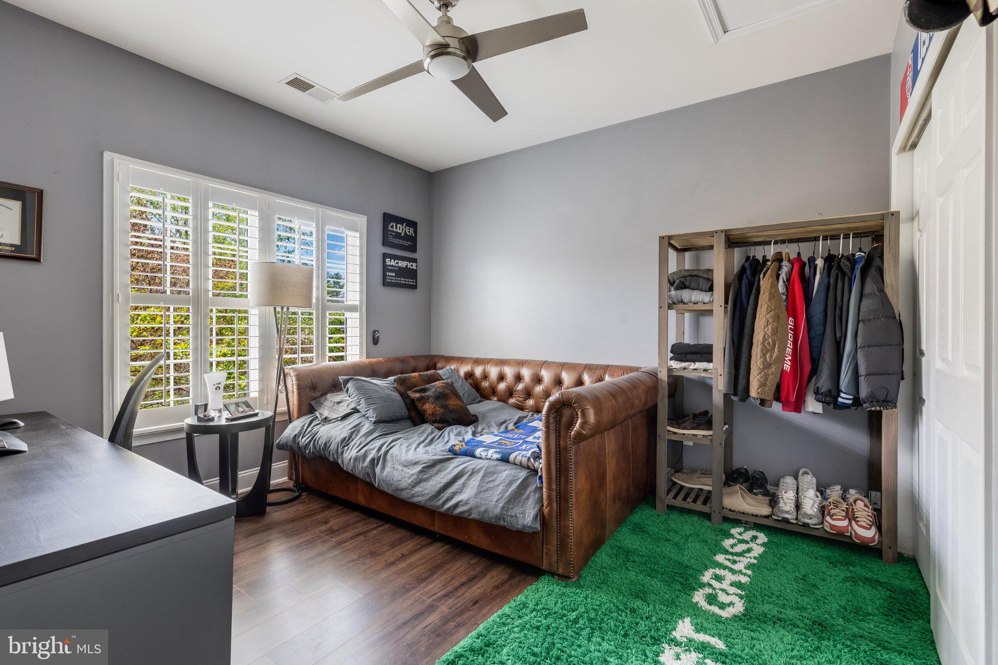 25554 Mimosa Tree Court Chantilly, VA 20152 - Photo 60 of 85 a living room with furniture and a large window
