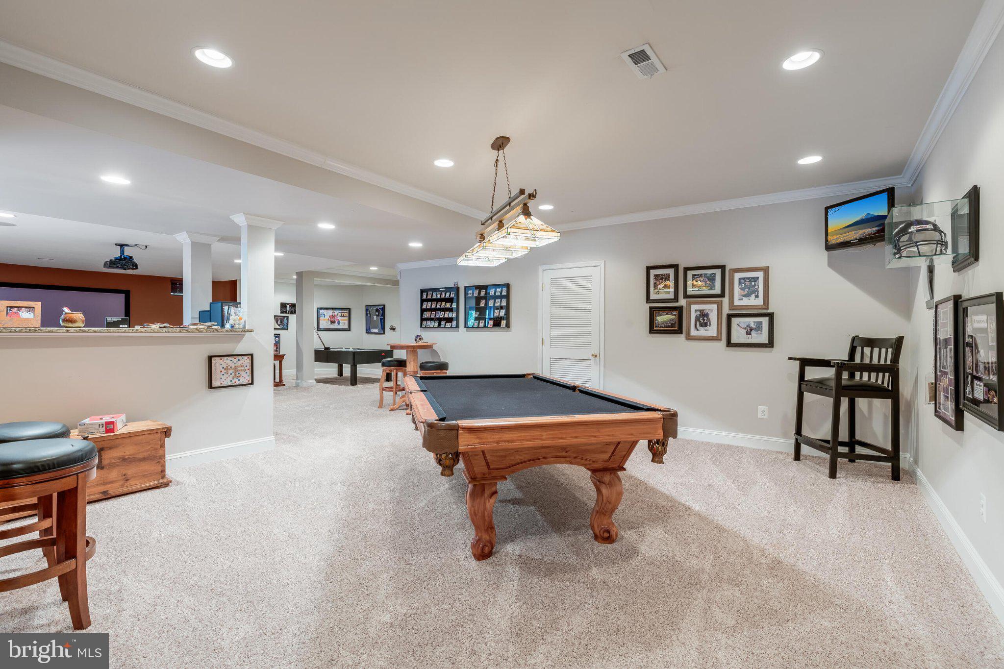 25554 Mimosa Tree Court Chantilly, VA 20152 - Photo 63 of 85 a room with furniture and a wooden floor