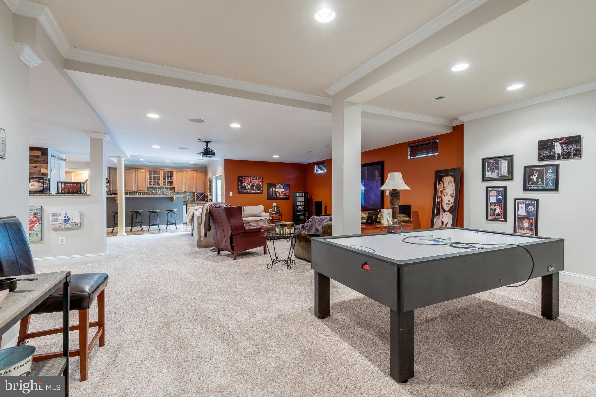 25554 Mimosa Tree Court Chantilly, VA 20152 - Photo 65 of 85 a living room with furniture a table and chairs in it