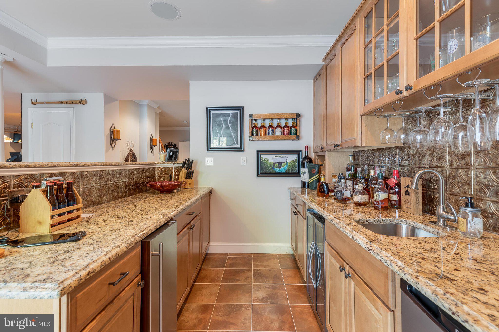 25554 Mimosa Tree Court Chantilly, VA 20152 - Photo 67 of 85 Elegant kitchen with granite finishes.