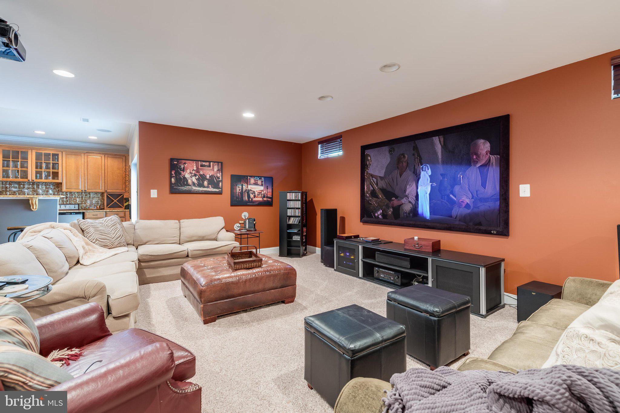 25554 Mimosa Tree Court Chantilly, VA 20152 - Photo 70 of 85 a living room with furniture and a flat screen tv