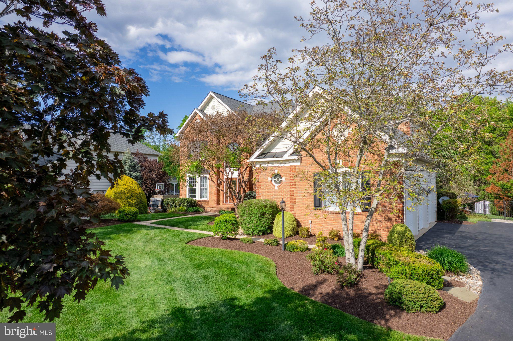 25554 Mimosa Tree Court Chantilly, VA 20152 - Photo 83 of 85 Charming brick home with lush landscaping.