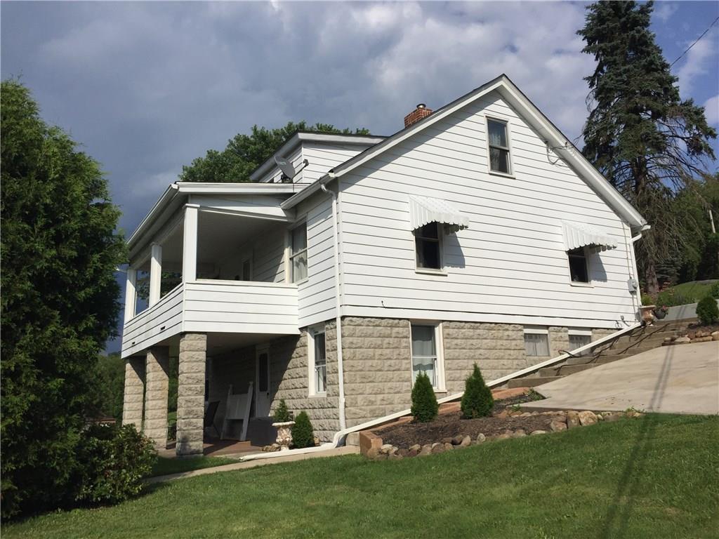 360 Lily Street North Huntingdon, PA 15642 - Photo 18 of 21 Exterior side view (off street parking area)