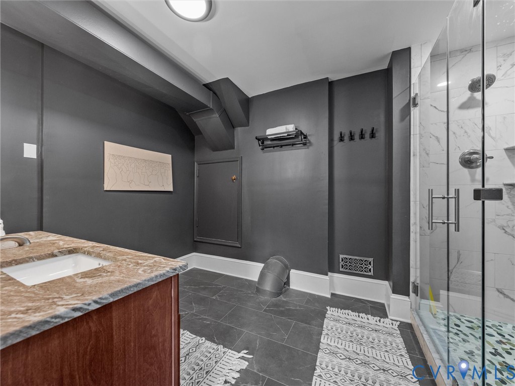 13099 Cedon Road Ashland, VA 23005 - Photo 58 of 92 Lower lever bath, walk-in shower with glass doors,