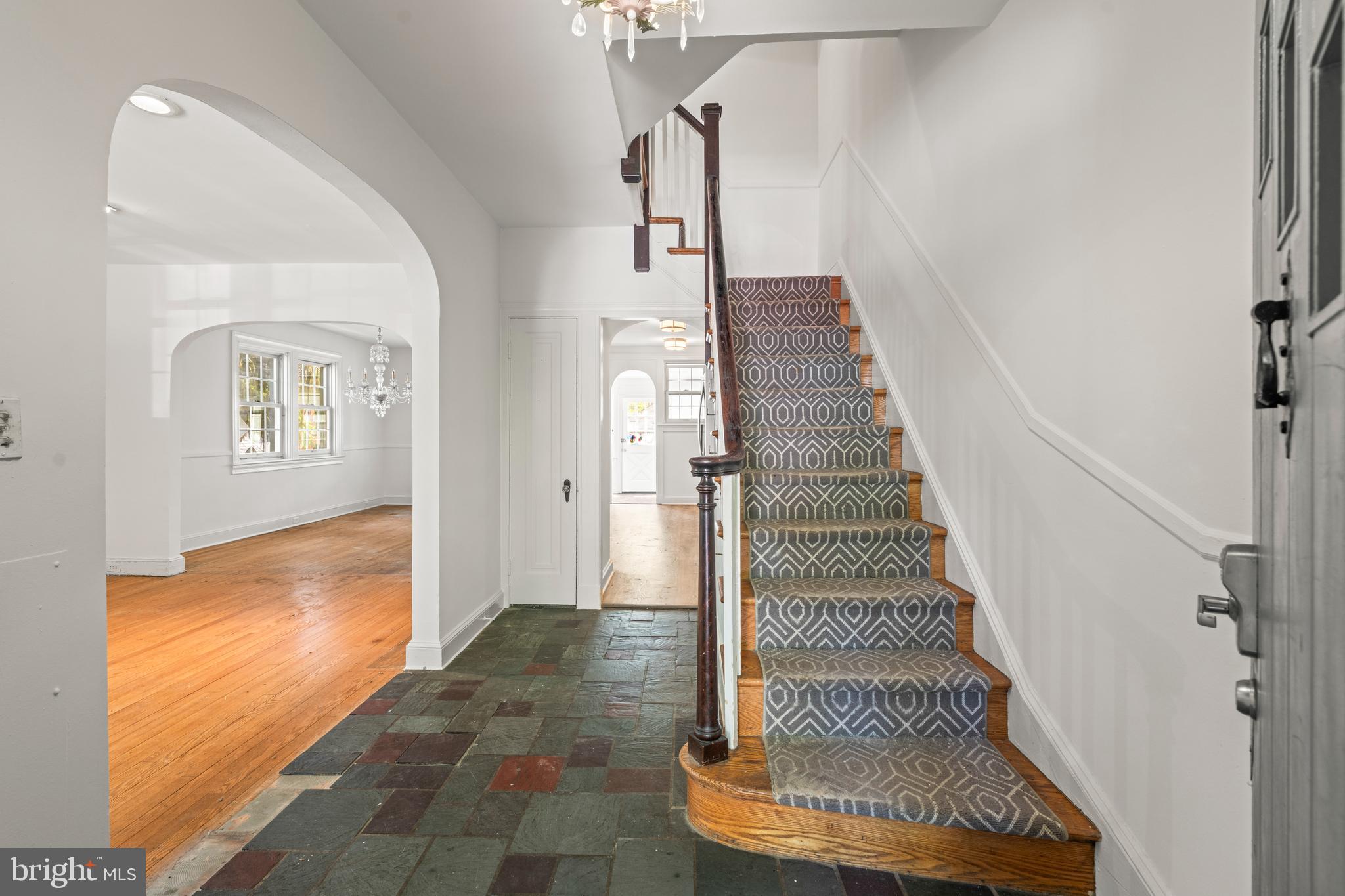 309 Hopkins Road Baltimore, MD 21212 - Photo 4 of 36 a view of entryway and hall with wooden floor