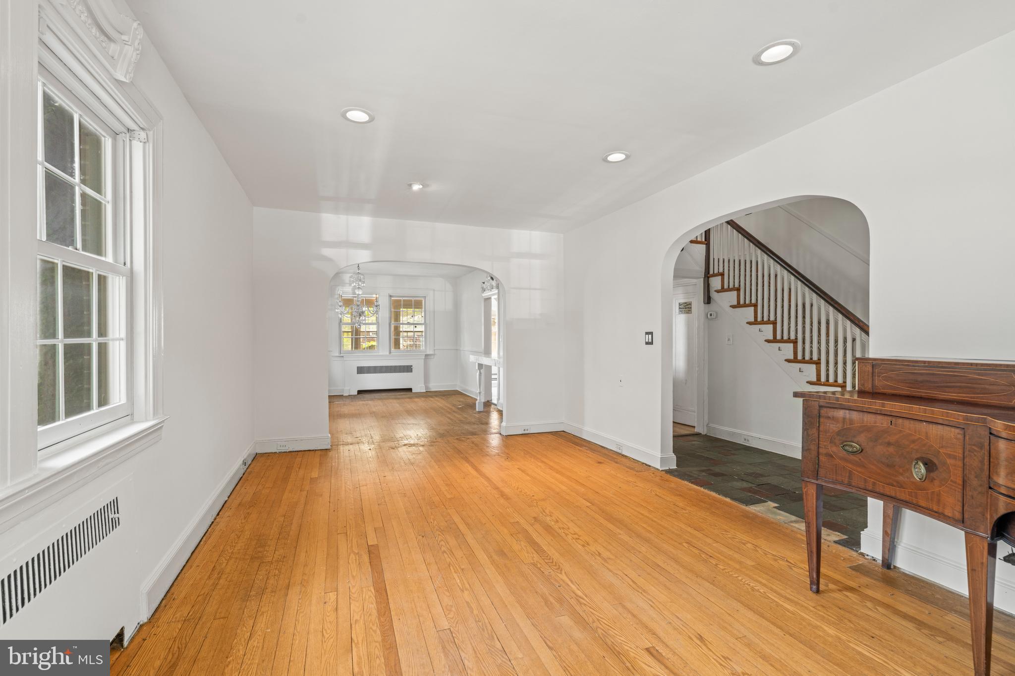 309 Hopkins Road Baltimore, MD 21212 - Photo 5 of 36 a view of empty room with wooden floor and fan