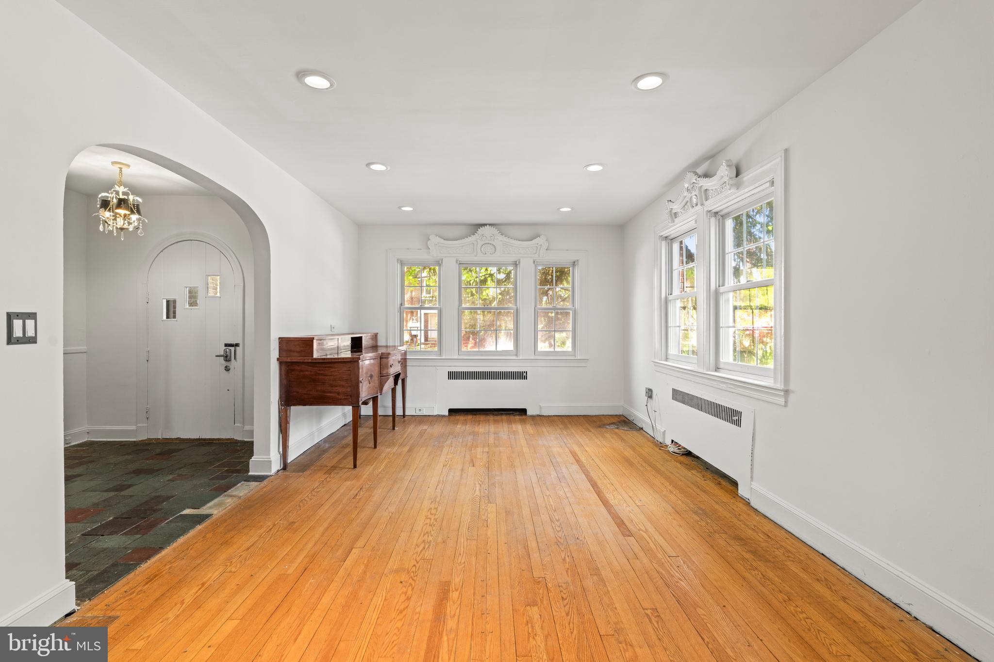 309 Hopkins Road Baltimore, MD 21212 - Photo 6 of 36 a view of a room with wooden floor and furniture
