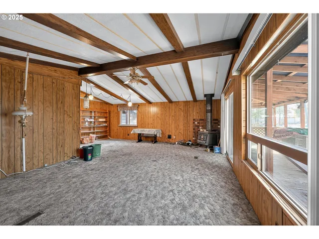 a bathroom with a sink mirror and vanity