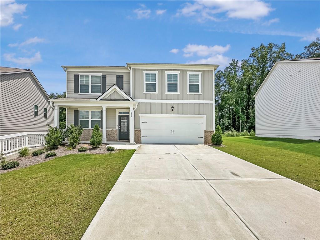 965 Athena Bend Fairburn, GA 30213 - Photo 3 of 37 a front view of house with yard