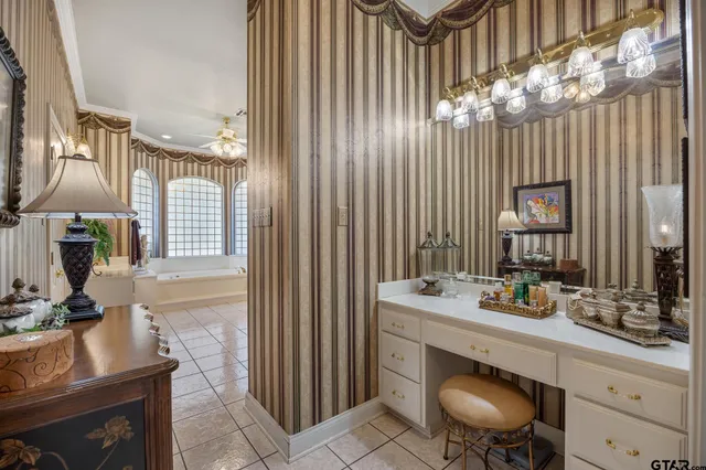 a kitchen with a sink cabinets and window