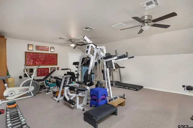a view of a room with gym equipment
