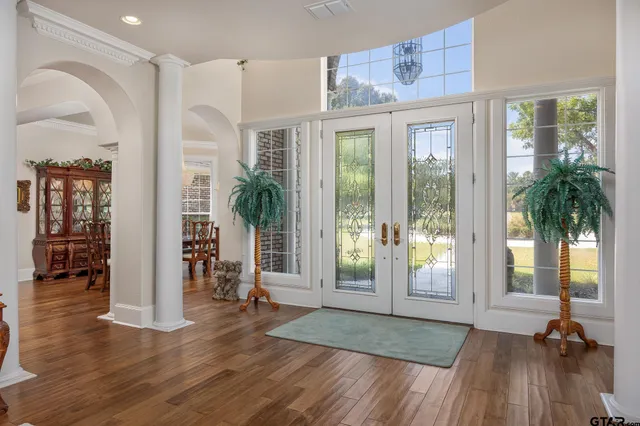 a view of livingroom with furniture and floor to ceiling window