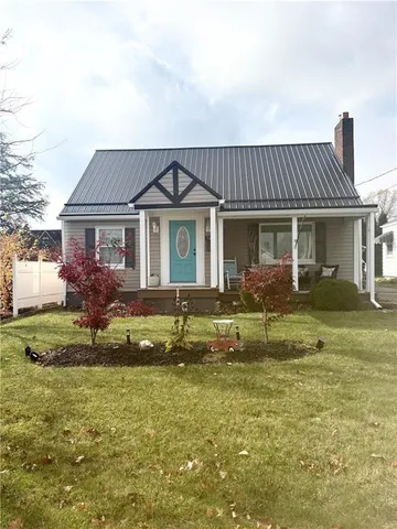 a view of a house with a garage