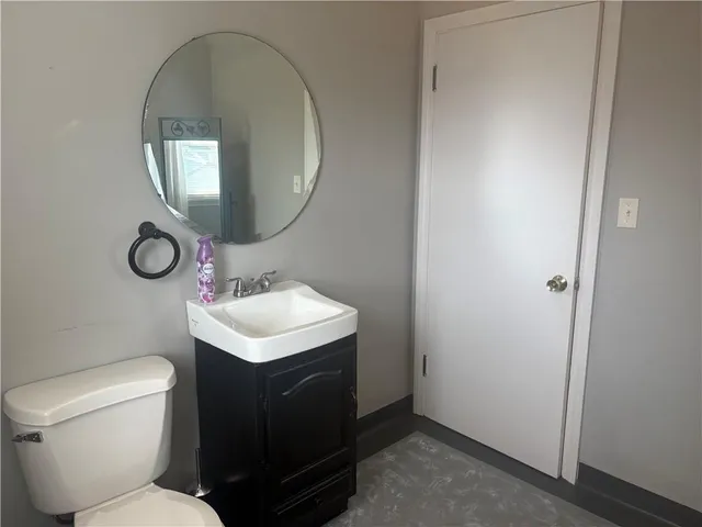 a view of kitchen with furniture and wooden floor