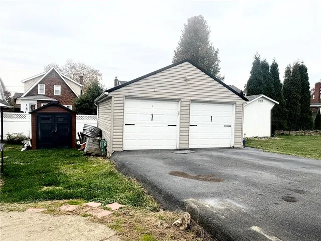 a kitchen with stainless steel appliances granite countertop a refrigerator stove and microwave