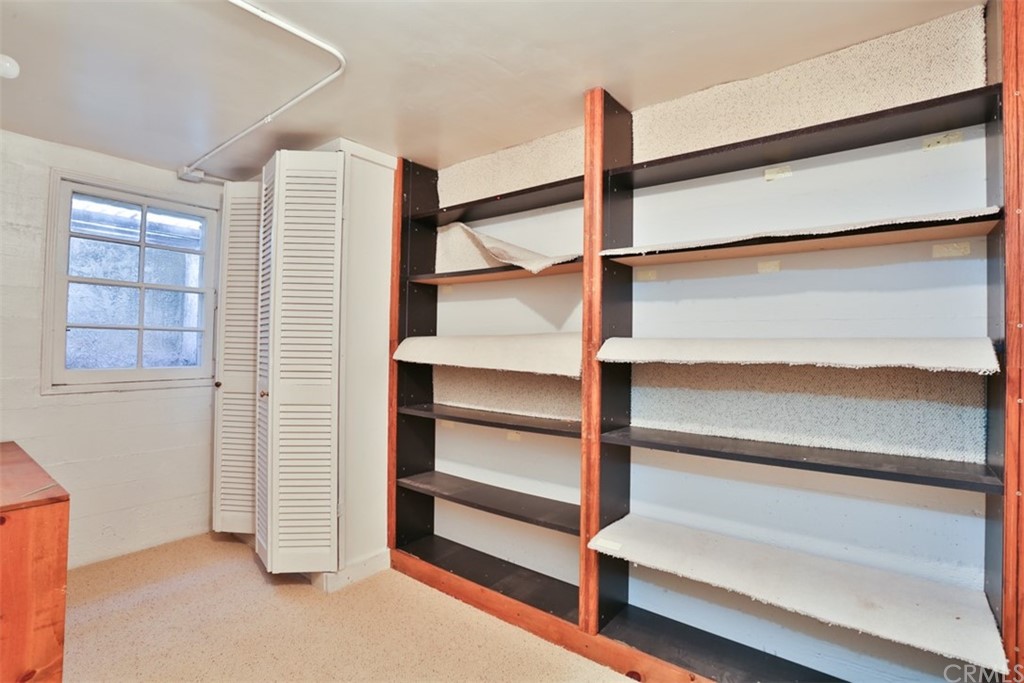 2235 Garfias Drive Pasadena, CA 91104 - Photo 14 of 40 a view of walk in closet with empty racks