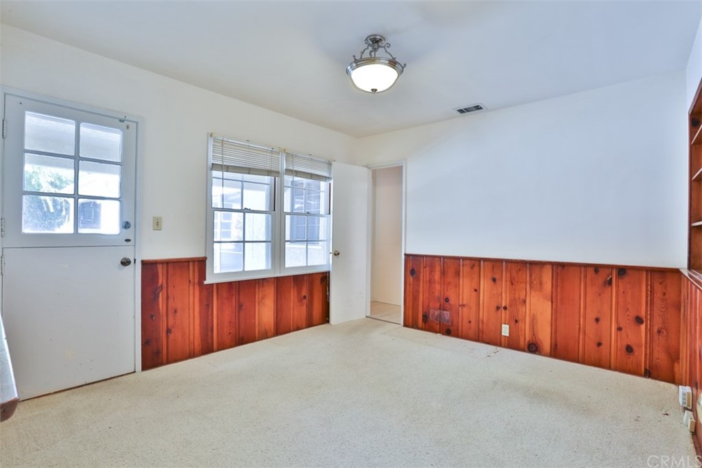 2235 Garfias Drive Pasadena, CA 91104 - Photo 16 of 40 an empty room with windows and cabinet