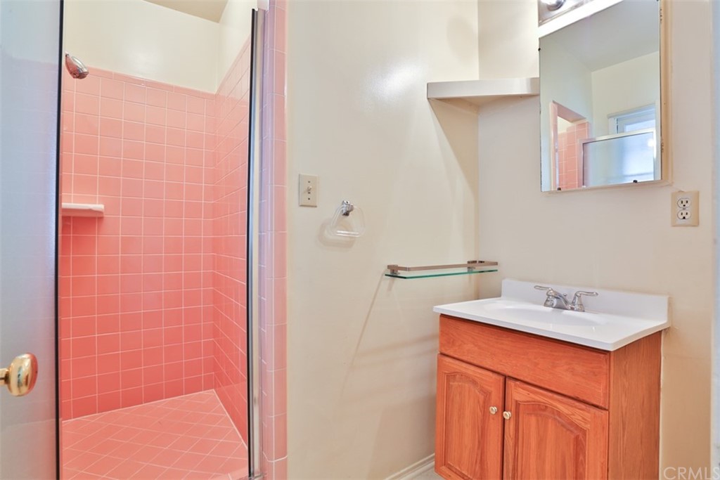2235 Garfias Drive Pasadena, CA 91104 - Photo 17 of 40 a bathroom with a sink and a mirror