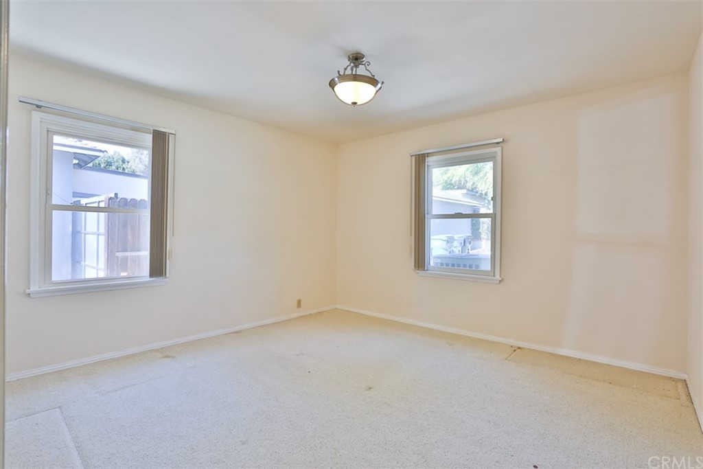2235 Garfias Drive Pasadena, CA 91104 - Photo 18 of 40 an empty room with windows
