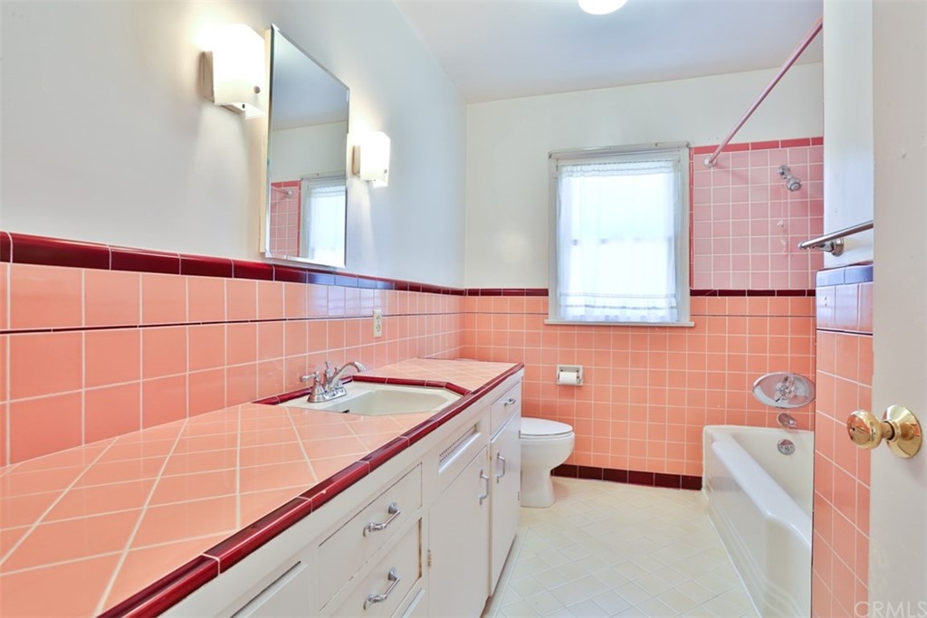 2235 Garfias Drive Pasadena, CA 91104 - Photo 22 of 40 a bathroom with a sink and a mirror