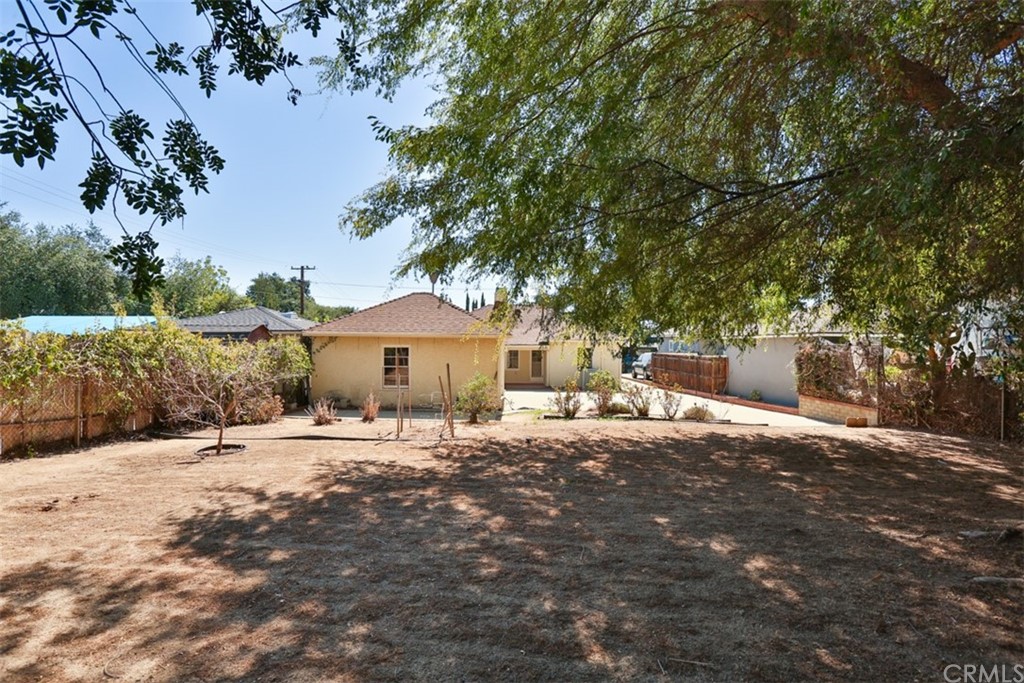 2235 Garfias Drive Pasadena, CA 91104 - Photo 28 of 40 a front view of a house with a yard and garage