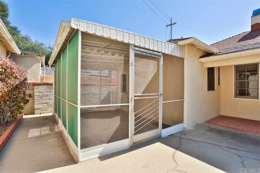 2235 Garfias Drive Pasadena, CA 91104 - Photo 29 of 40 a view of a house with a door and wooden floor