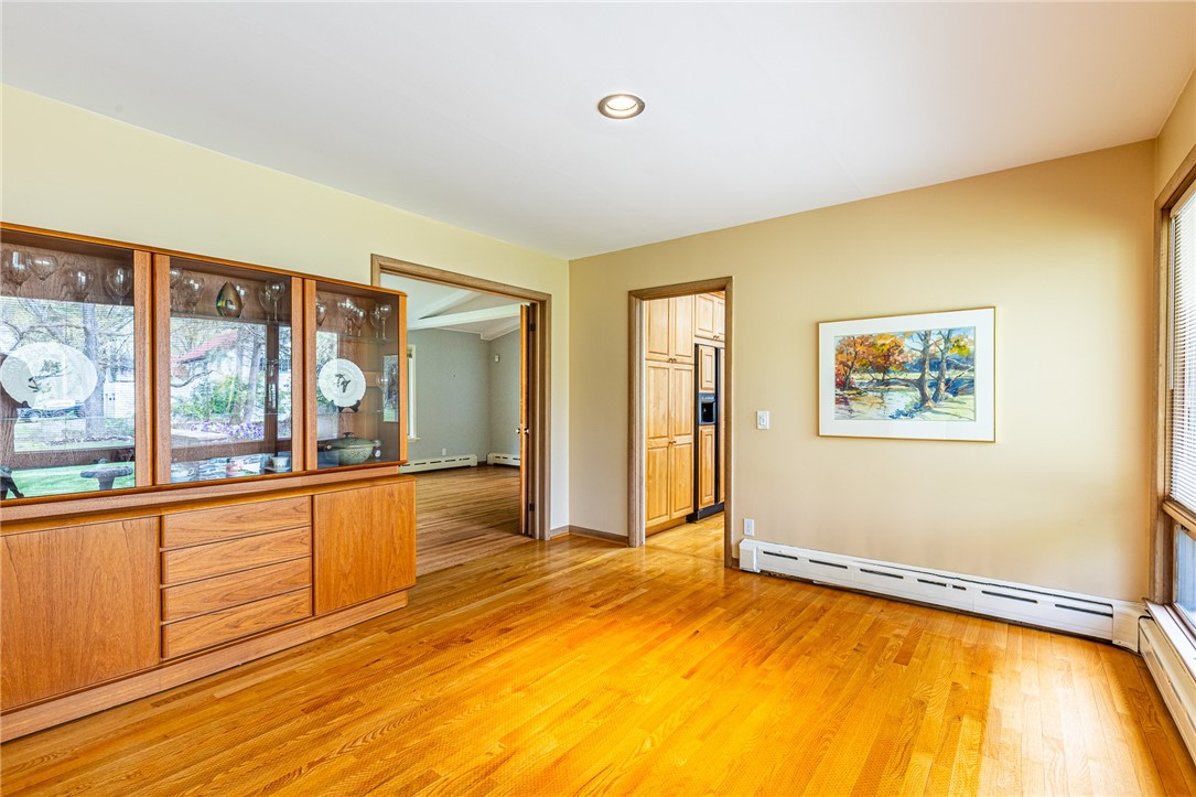 1615 Clover Street Brighton, NY 14618 - Photo 12 of 48 Dining room with a large teak china cabinet