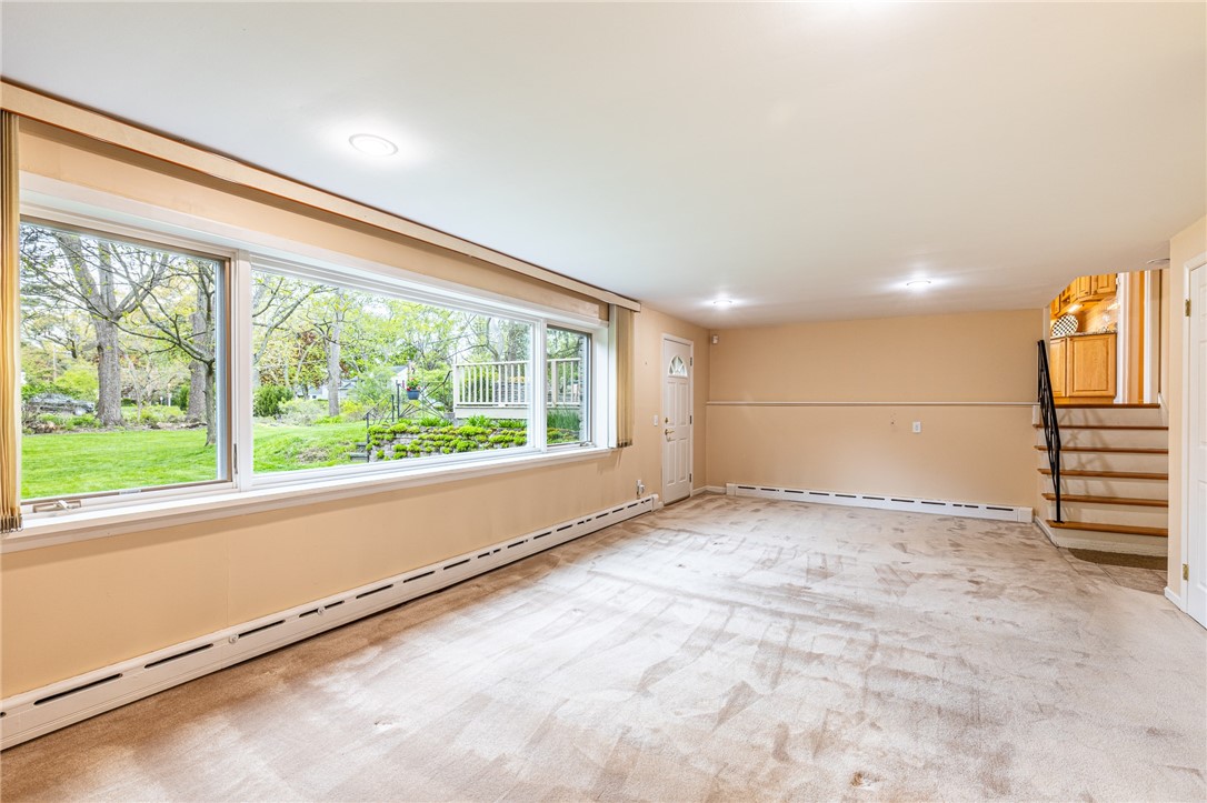 1615 Clover Street Brighton, NY 14618 - Photo 21 of 48 The entertainment room as a VERY large window.